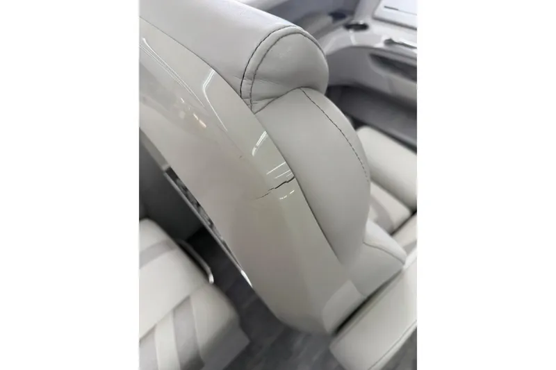 Slide: The Image of Cracked seat detail in 2022 Crest Continental 250 SLS boat interior. - 31