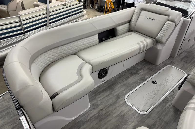 Slide: The Image of 2022 Crest Continental 250 SLS boat interior with luxurious seating and modern design. - 4
