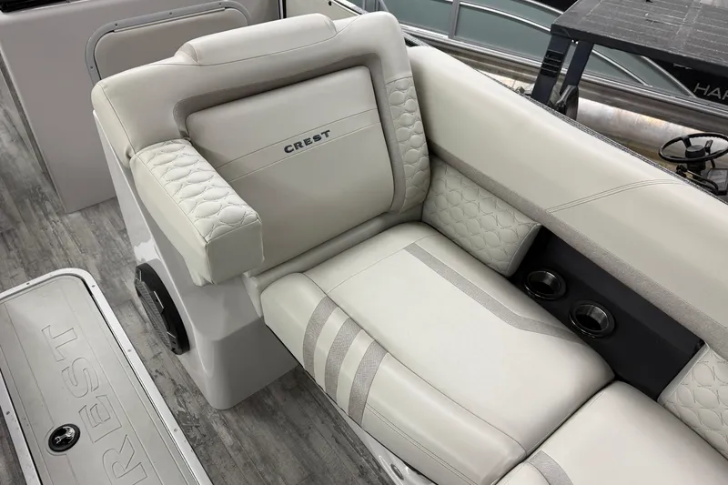 Slide: The Image of Luxurious seating on 2022 Crest Continental 250 SLS boat with elegant upholstery and cup holders. - 5