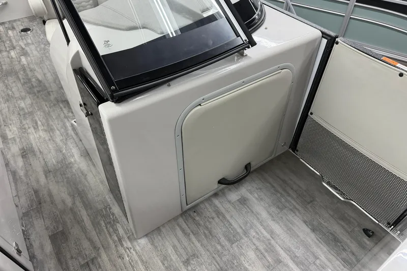 Slide: The Image of 2022 Crest Continental 250 SLS boat interior with sleek flooring and modern design. - 7