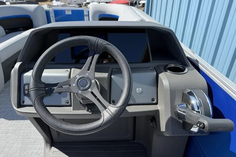 Slide: The Image of Steering console of 2026 Sun Tracker Party Barge 20 DLX pontoon boat. - 19