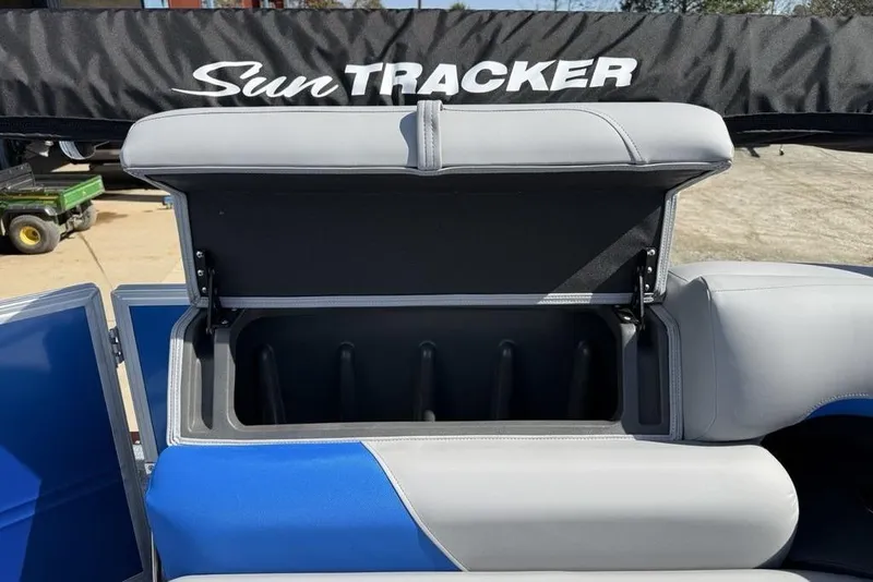 Slide: The Image of 2026 Sun Tracker Party Barge 20 DLX with open storage compartment. - 26