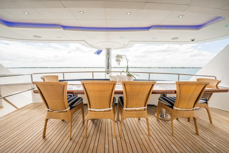 Slide: The Image of Luxurious deck dining area on 1996 Cheoy Lee 145 Global Series yacht. - 17