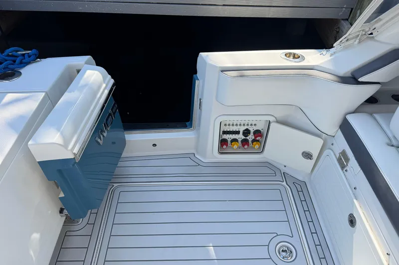 Slide: The Image of 2021 World Cat 400 DC-X boat interior with control panel and seating area. - 20