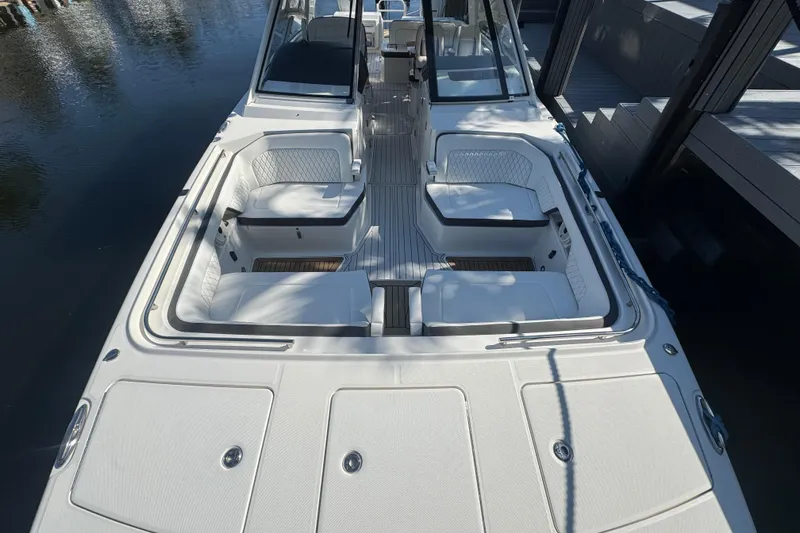 Slide: The Image of 2021 World Cat 400 DC-X boat with spacious seating and sleek design. - 3