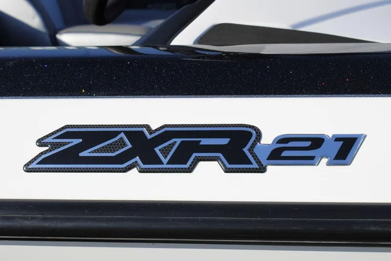 Slide: The Image of 2023 Skeeter ZXR21 logo on a sleek black and white surface. - 10