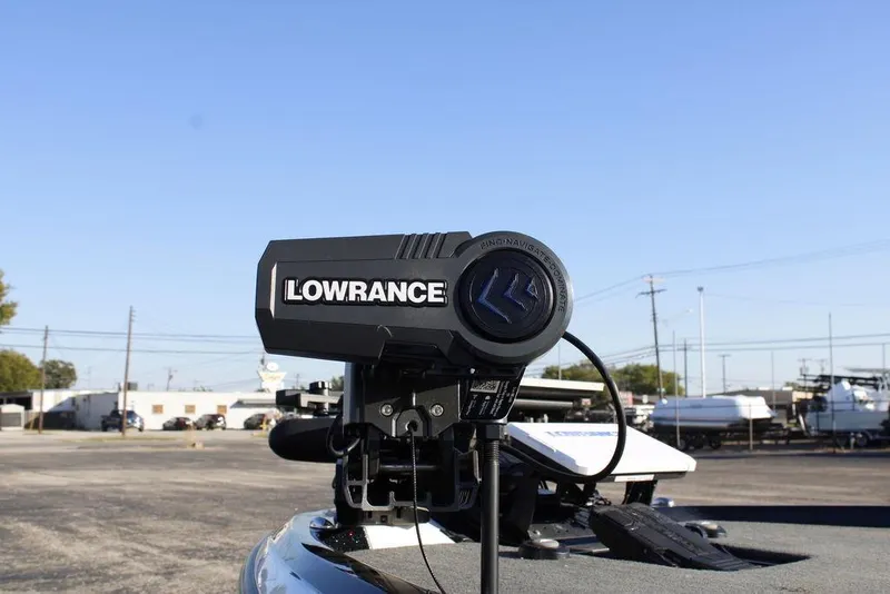 Slide: The Image of Lowrance device on 2023 Skeeter ZXR21 boat, clear blue sky background. - 16