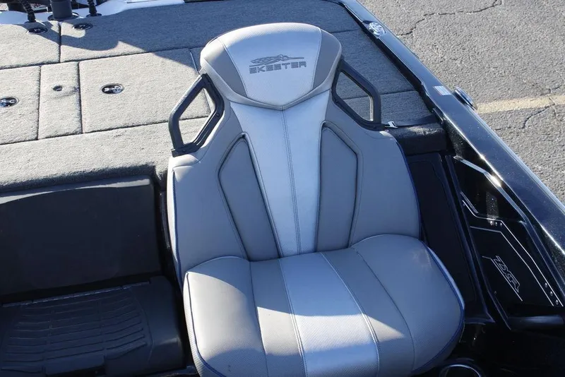Slide: The Image of 2023 Skeeter ZXR21 boat seat with gray upholstery and logo detailing. - 34