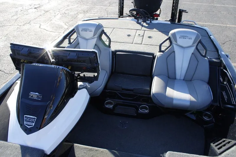 Slide: The Image of 2023 Skeeter ZXR21 boat interior with dual seats and advanced navigation displays. - 35