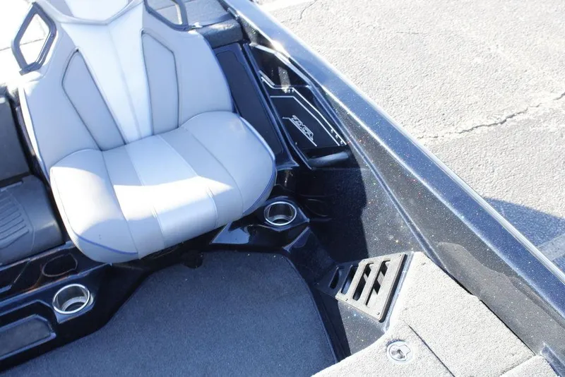 Slide: The Image of 2023 Skeeter ZXR21 boat interior with gray seat and cup holders. - 38