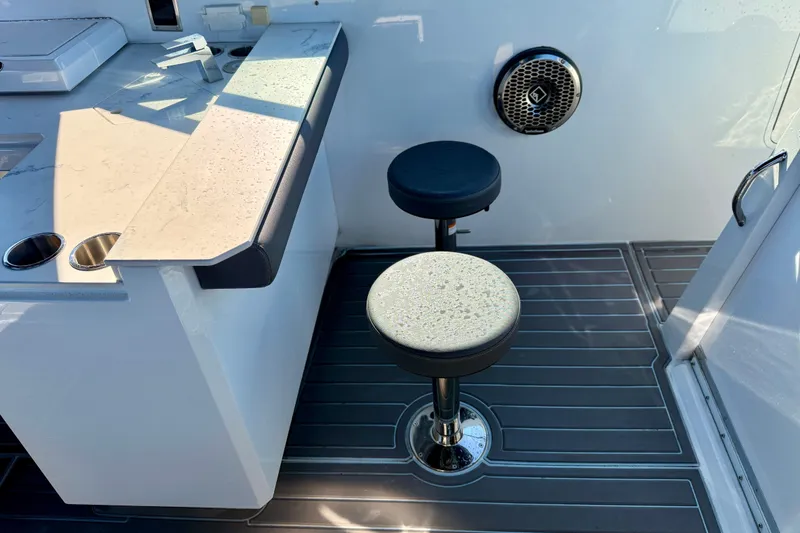 Slide: The Image of Luxurious bathroom in 2022 New Cruiser Yachts GLS 38, featuring modern fixtures and elegant wood finishes. - 44