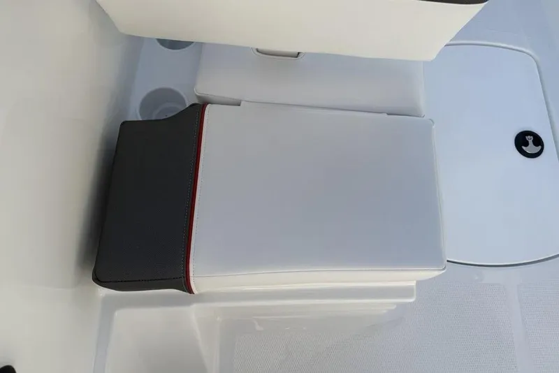 Slide: The Image of 2026 Tahoe T16 boat seat with white and black upholstery, featuring a red accent stripe. - 10