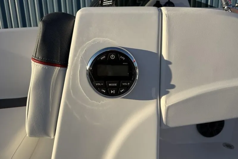Slide: The Image of 2026 Tahoe T16 boat dashboard with control panel and seat detail. - 18