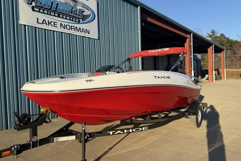 Slide: The Image of 2026 Tahoe T16 boat in red and white at Foothills Marine Center, Lake Norman. - 2