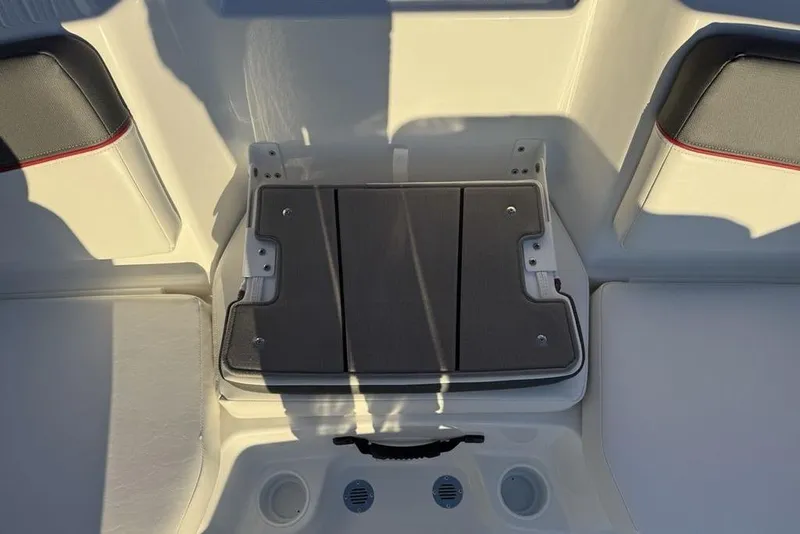 Slide: The Image of 2026 Tahoe T16 boat interior seating with storage compartment. - 23