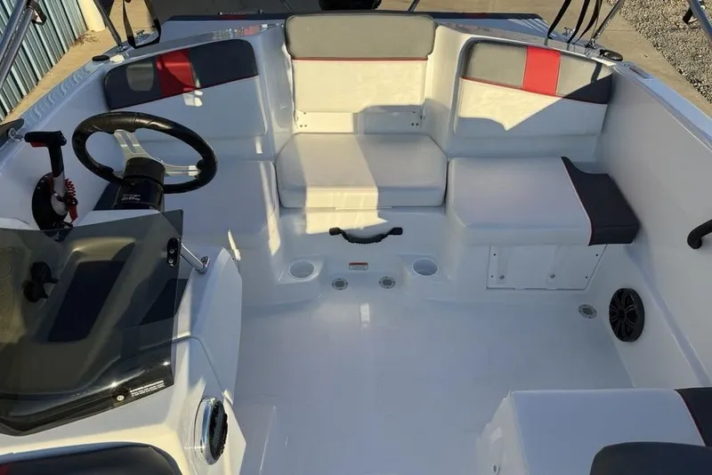 Slide: The Image of Interior of 2026 Tahoe T16 boat with seating and steering wheel. - 9
