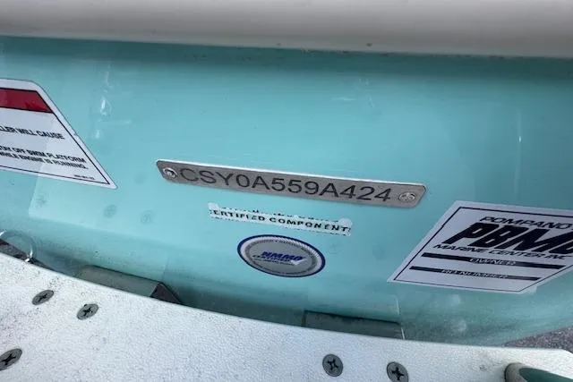 Slide: The Image of 2024 Carolina Skiff 24 Ultra Elite boat identification plate and certification labels. - 5
