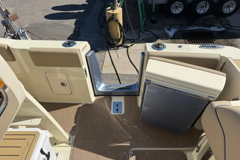 Slide: The Image of 2023 Chris-Craft Catalina 24 boat interior with seating and storage compartments. - 9