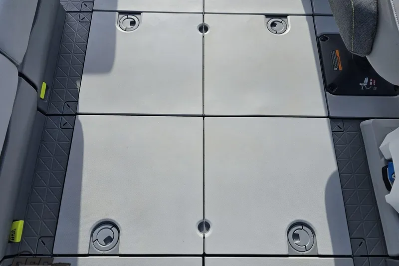 Slide: The Image of 2023 Sea-Doo Switch Cruise 21 deck with modular flooring system. - 108