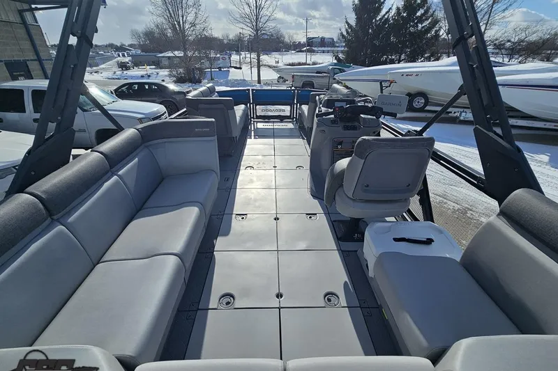 Slide: The Image of 2023 Sea-Doo Switch Cruise 21 interior with spacious seating and modern controls. - 45