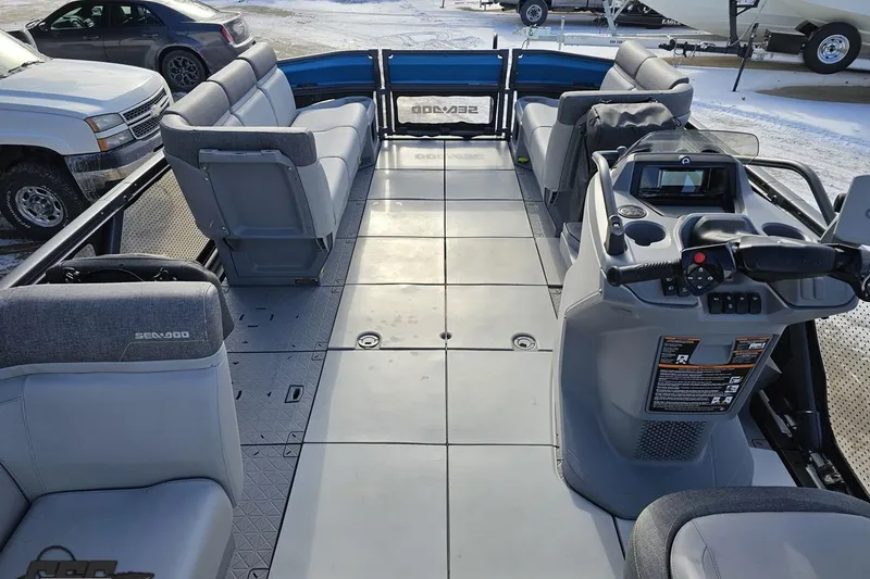 Slide: The Image of 2023 Sea-Doo Switch Cruise 21 interior with spacious seating and modern controls. - 60