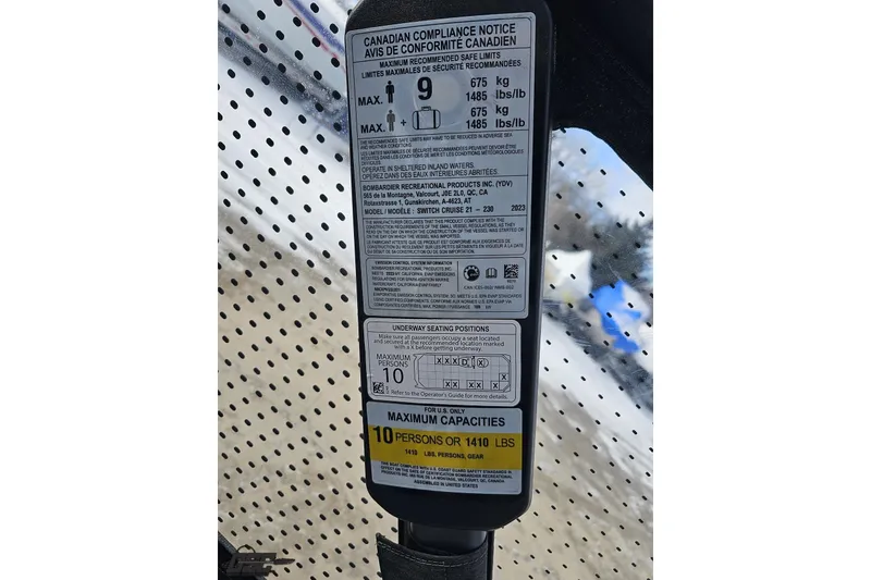 Slide: The Image of 2023 Sea-Doo Switch Cruise 21 compliance notice showing maximum capacities and safety limits. - 65