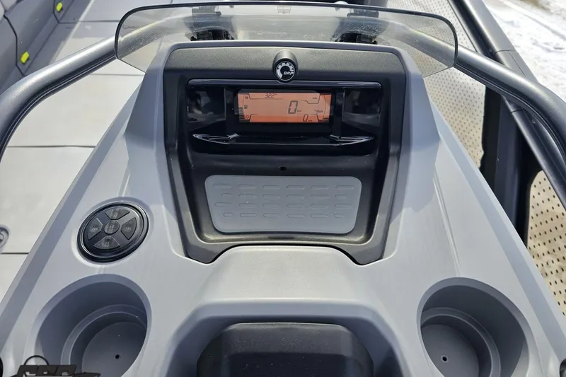 Slide: The Image of 2023 Sea-Doo Switch Cruise 21 dashboard with digital display and controls. - 70