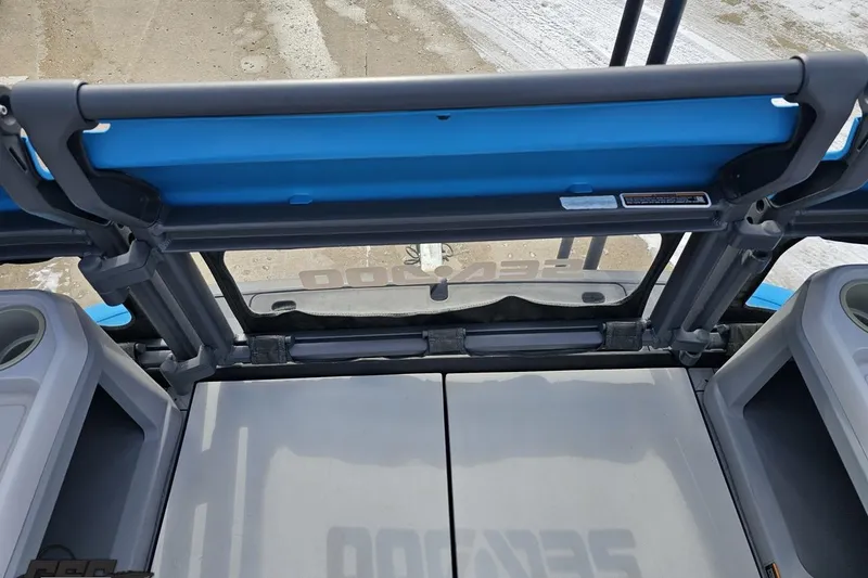 Slide: The Image of 2023 Sea-Doo Switch Cruise 21 interior view with seating and storage compartments. - 95