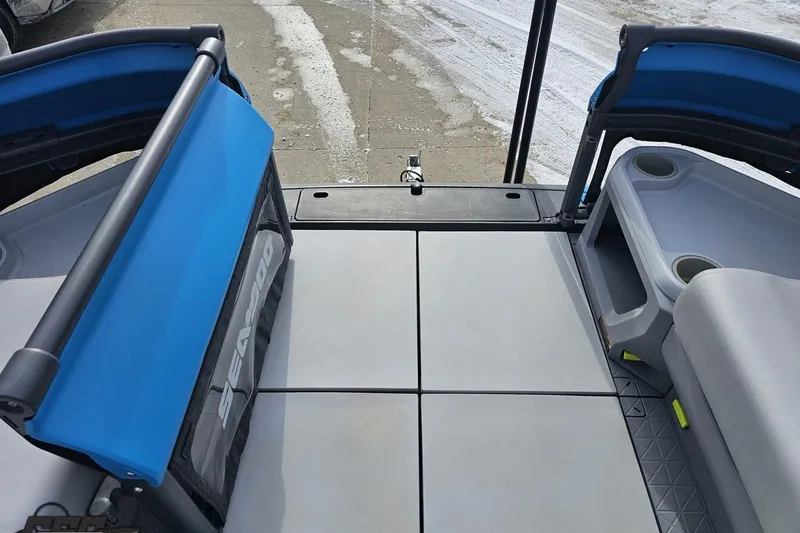 Slide: The Image of 2023 Sea-Doo Switch Cruise 21 deck with seating and storage compartments. - 97
