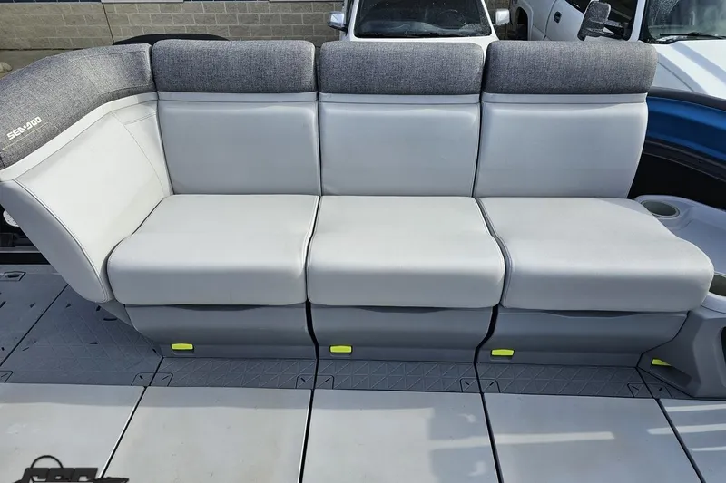 Slide: The Image of 2023 Sea-Doo Switch Cruise 21 seating, featuring gray upholstery and modern design. - 99