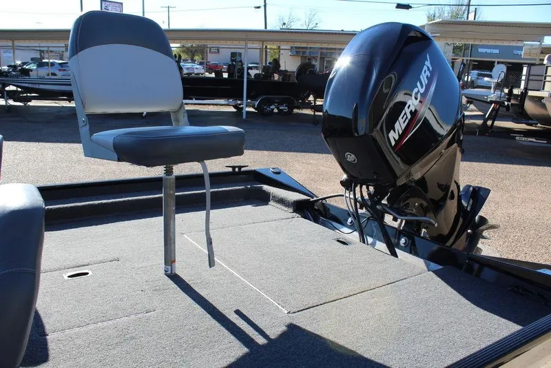 Slide: The Image of 2023 Lowe Skorpion 17 boat with Mercury outboard motor and swivel seat. - 10