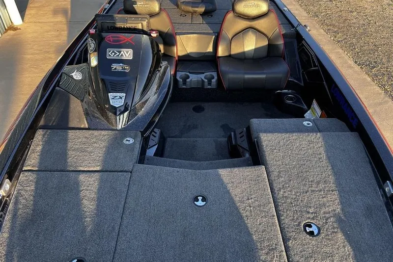 Slide: The Image of 2023 Skeeter ZX200 boat interior with seating and storage compartments. - 10