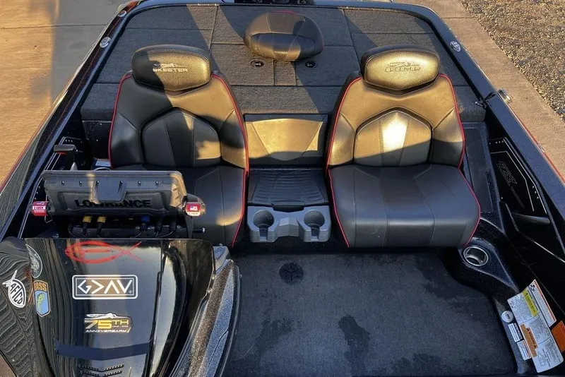 Slide: The Image of 2023 Skeeter ZX200 boat interior with dual seats and navigation system. - 13