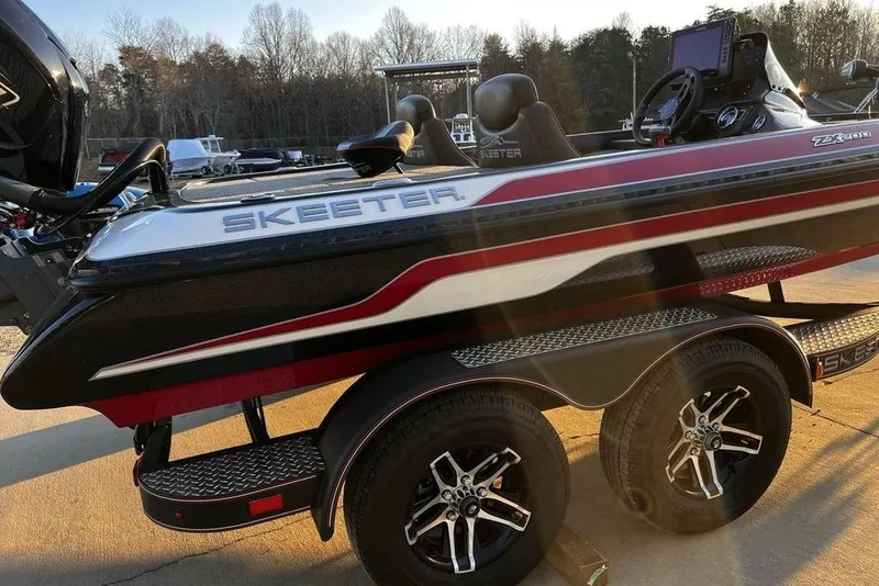 Slide: The Image of 2023 Skeeter ZX200 boat on trailer, featuring sleek design and modern equipment. - 22