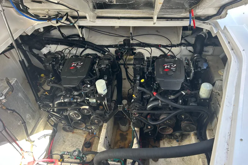 Slide: The Image of Engine compartment of a 2007 Sea Ray Sundancer 310 with twin MerCruiser engines. - 24