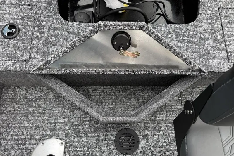 Slide: The Image of 2026 Tracker Pro Guide V-16 SC boat interior with storage compartment and wiring. - 13