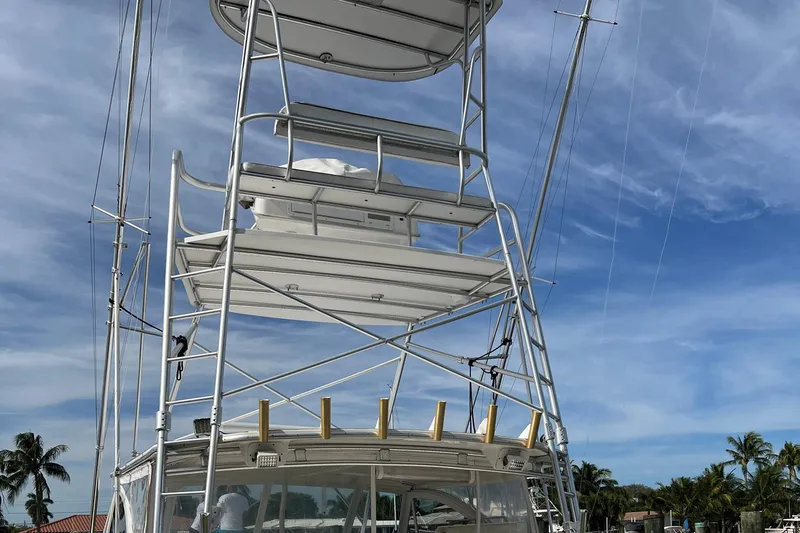 Slide: The Image of 2007 Luhrs 41 Hardtop boat tower against a clear blue sky. - 24