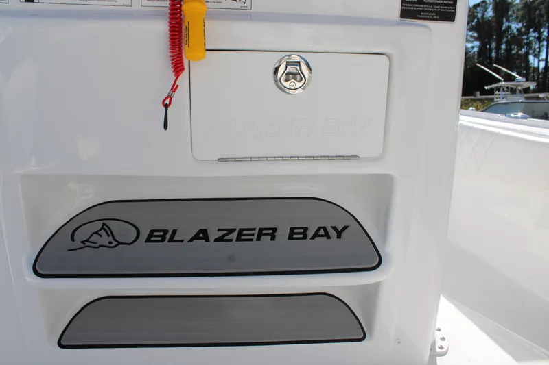 Slide: The Image of 2026 Blazer Bay 2440 boat interior with logo and safety features. - 20