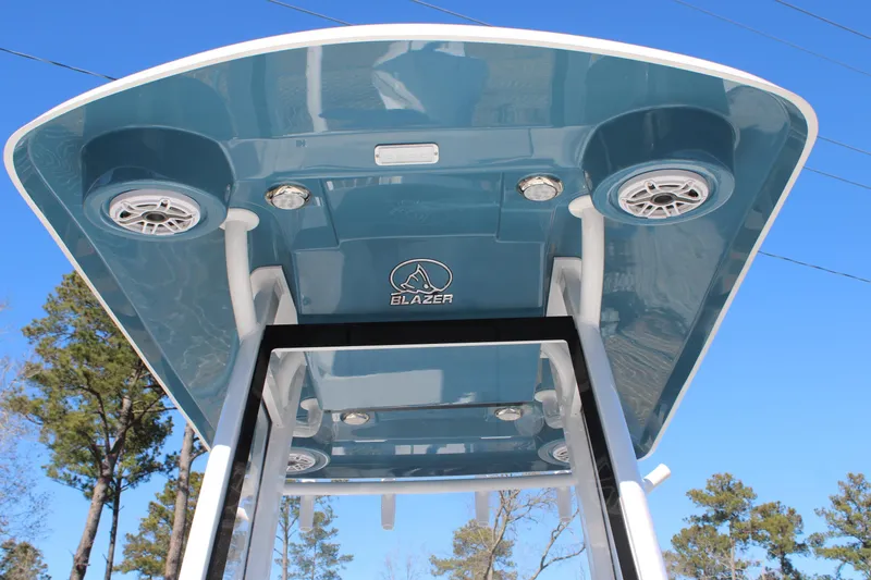 Slide: The Image of 2026 Blazer Bay 2440 boat canopy with speakers and lights, viewed from below. - 27