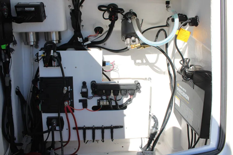 Slide: The Image of Electrical system inside 2026 Blazer Bay 2440 boat, featuring wiring and components. - 38
