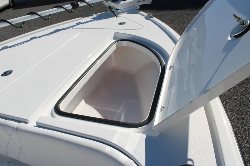 Slide: The Image of Open storage compartment on 2026 Blazer Bay 2440 boat deck. - 42