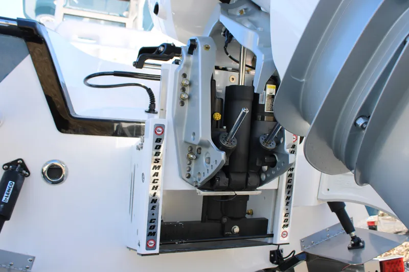 Slide: The Image of 2026 Blazer Bay 2440 boat engine mount with hydraulic components. - 59