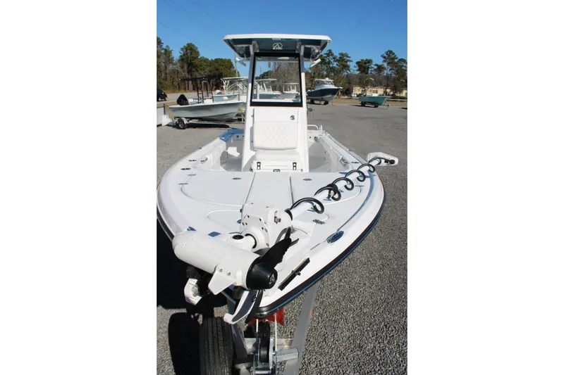 Slide: The Image of 2026 Blazer Bay 2440 boat on trailer, featuring sleek design and modern equipment. - 70