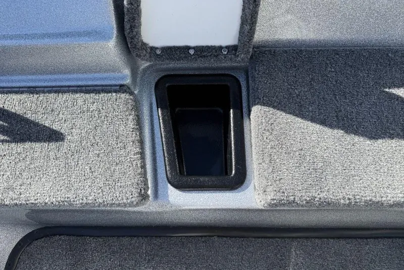 Slide: The Image of Steering wheel and dashboard of 2026 Phoenix 818 Pro boat, featuring modern controls and gauges. - 15