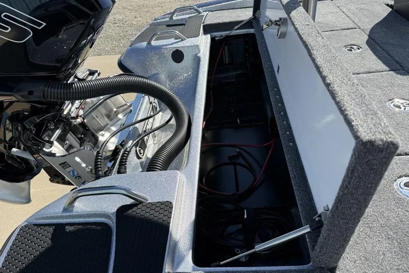 Slide: The Image of 2026 Phoenix 818 Pro boat interior with storage compartments and seating. - 19