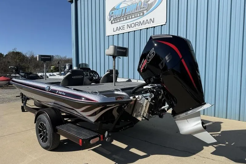 Slide: The Image of 2026 Phoenix 818 Pro boat interior with open storage compartments. - 6