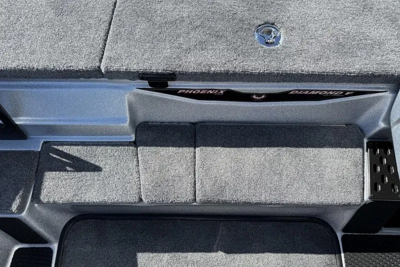 Slide: The Image of Phoenix 818 Pro 2026 boat storage compartment with sleek interior design. - 9