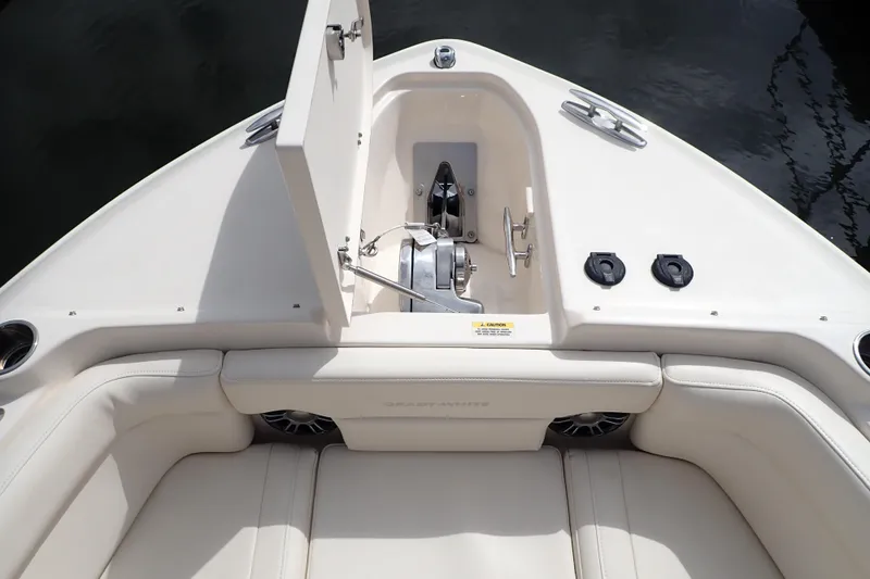 Slide: The Image of 2021 Grady-White Freedom 275 boat interior with anchor storage and seating area. - 28