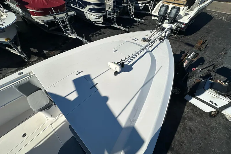 Slide: The Image of 2005 Contender 36 Cuddy boat on trailer, viewed from above, in a marina setting. - 29