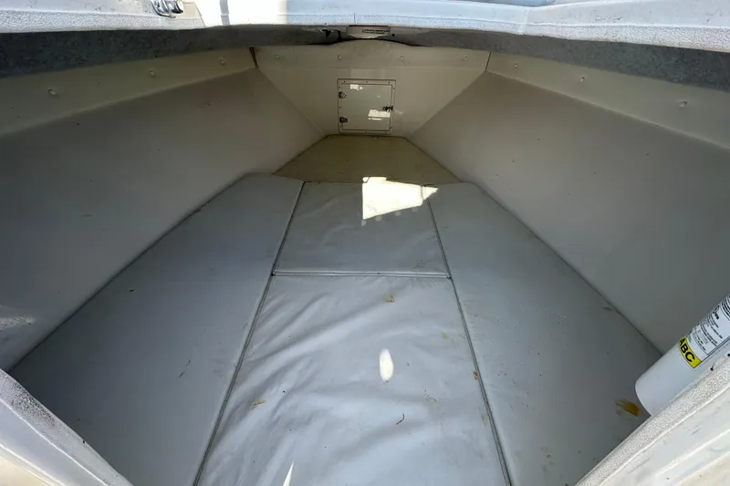 Slide: The Image of 2005 Contender 36 Cuddy cabin interior, featuring spacious sleeping area. - 30